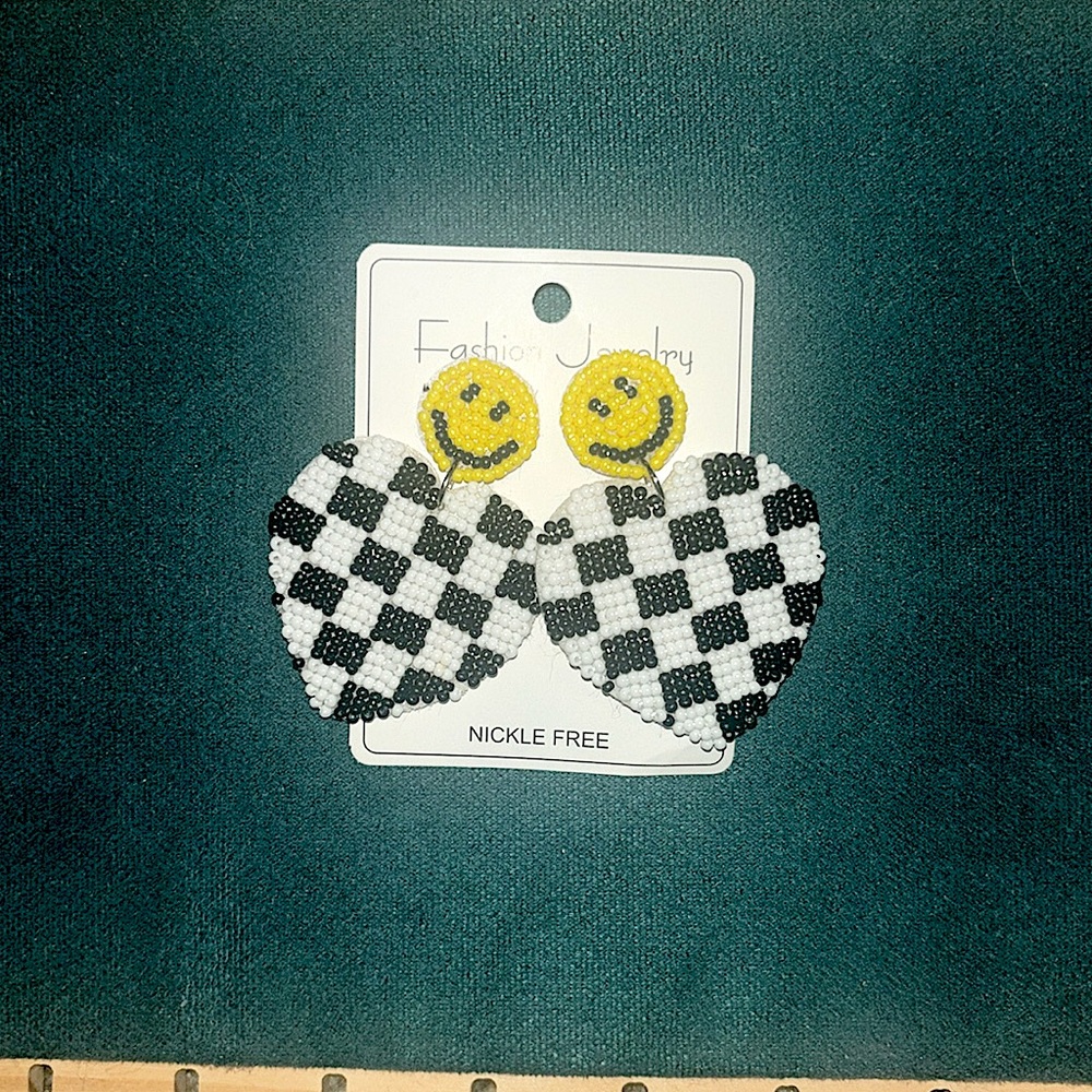 Smiley face checkard heart earrings